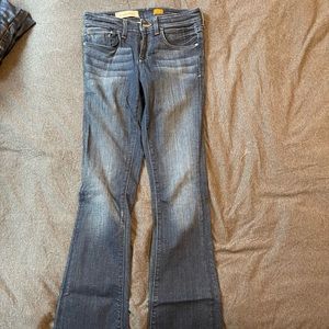 Boot cut medium wash jeans. Fits like a 2.